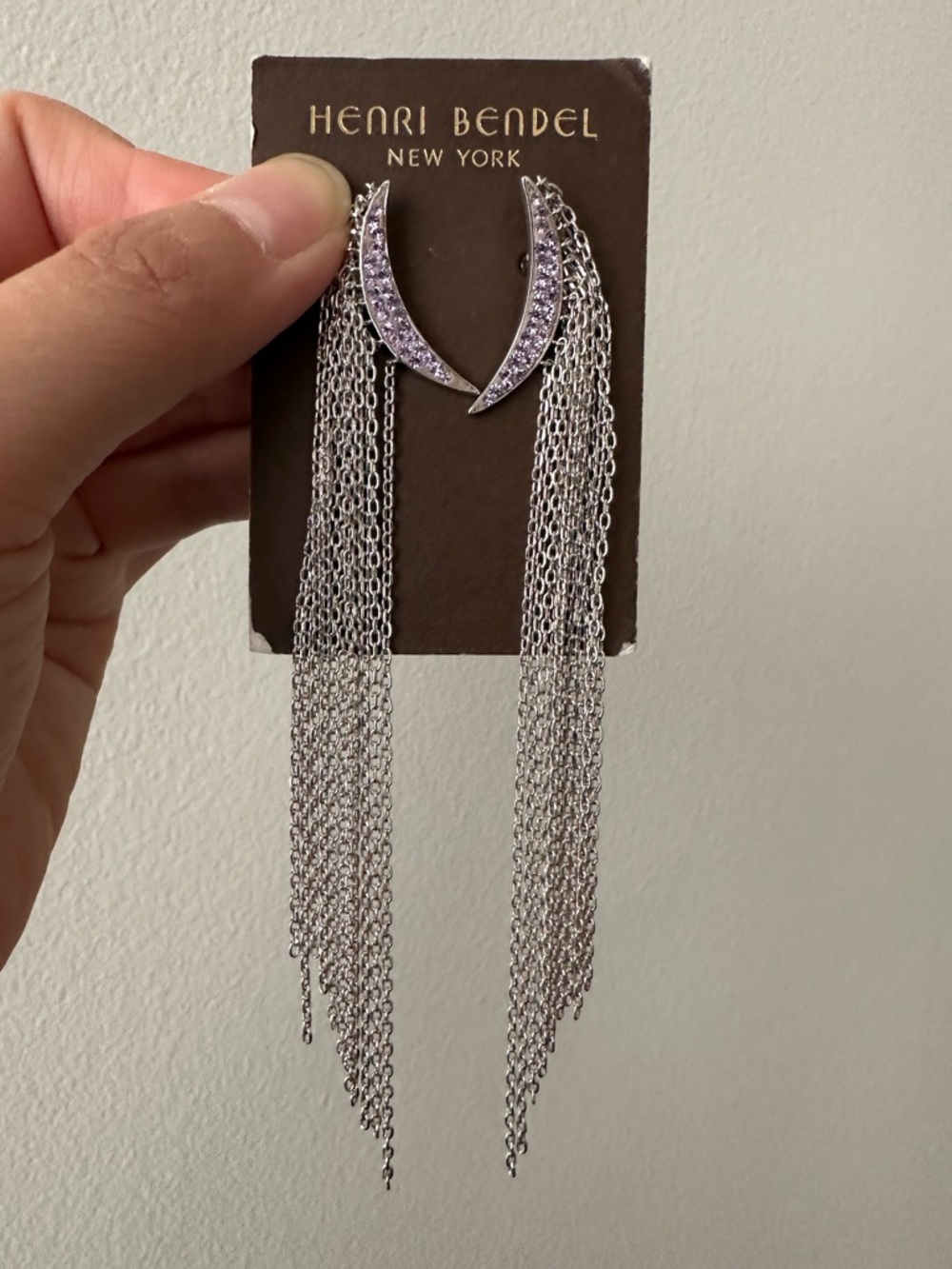 Henri Bendel crescent crystal dangly chain earrings